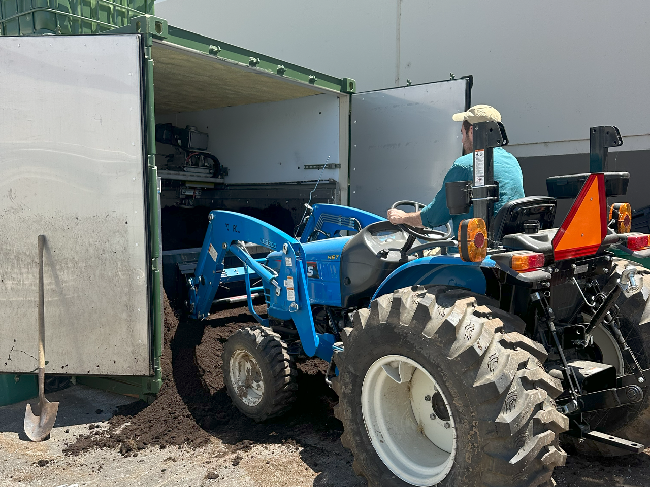Crop Circle Unloading Finished Compost from Earth Flow